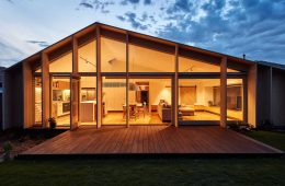 Home-solar-energy-system-with-Tesla-Powerwall-battery-mounted-outside