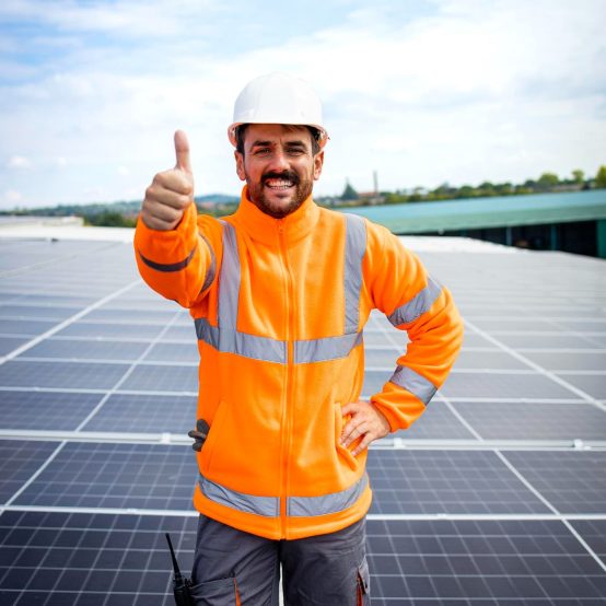 Connect Energy technician supporting a happy customer after a successful solar maintenance service